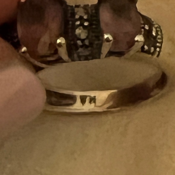 I have a trio of amethysts in this silver ring with marquisate stones - Picture 2 of 6